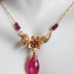 Pink Quartz And Gold Plated Flower Pendant..