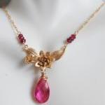 Pink Quartz And Gold Plated Flower Pendant..